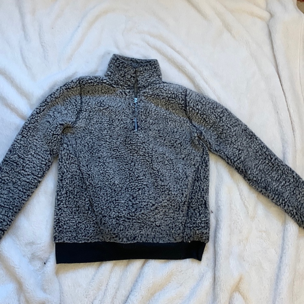 worn a little bit but in good shape , grey and black.